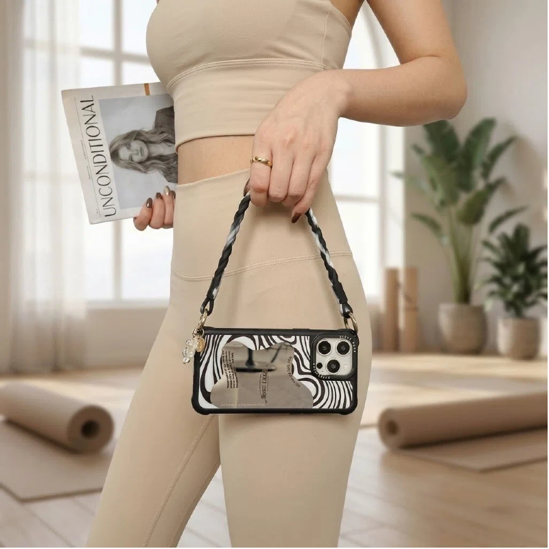 black mirror phone case with braided wrist strap – handbag carry lifestyle