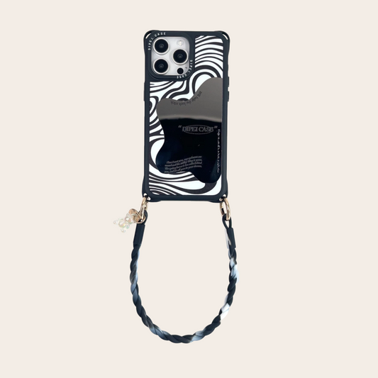 black mirror phone case with wrist strap – flatlay